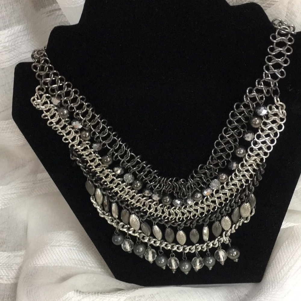 Statement necklace in silver and grey shades